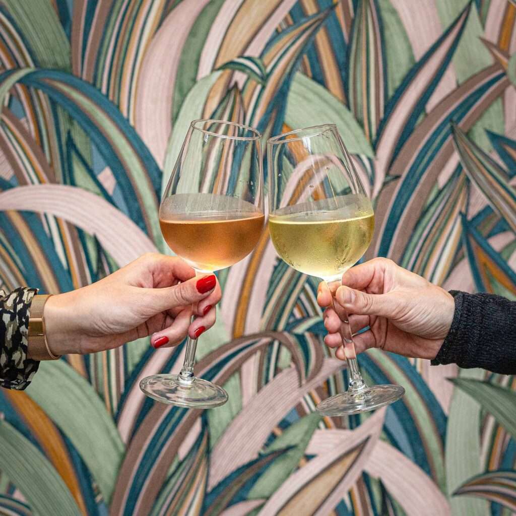 Cider tasting blog image of two people cheersing